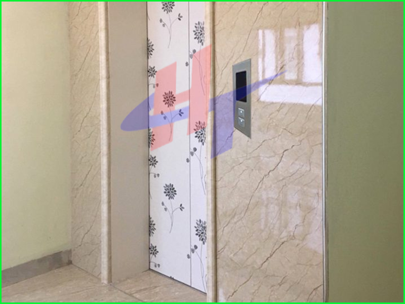 tấm nhựa vân đá ốp cửa cầu thang máy -2