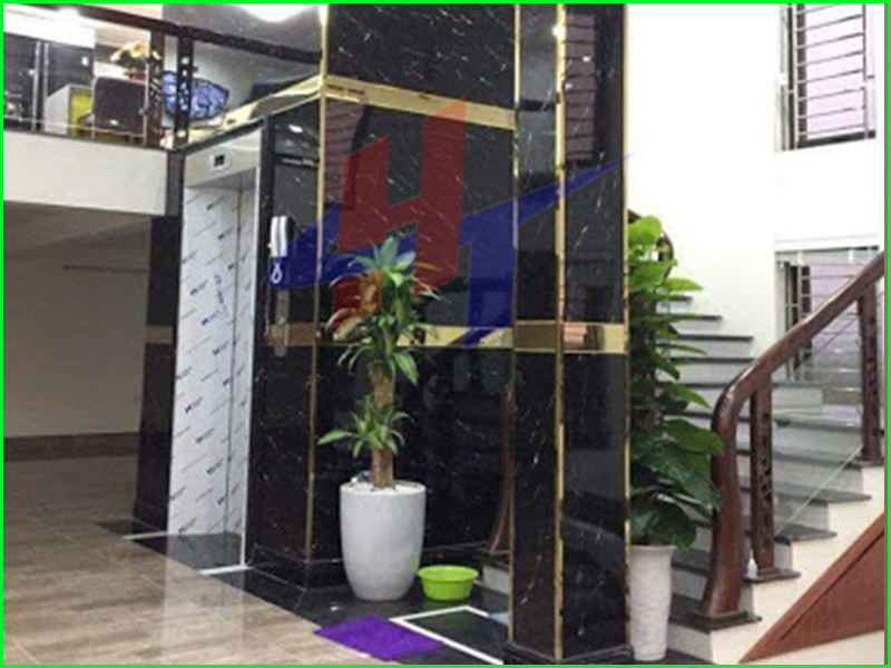 tấm nhựa vân đá ốp cửa cầu thang máy -3