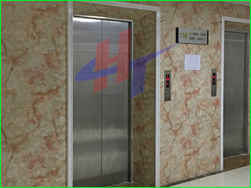 tấm nhựa vân đá ốp cửa cầu thang máy -4